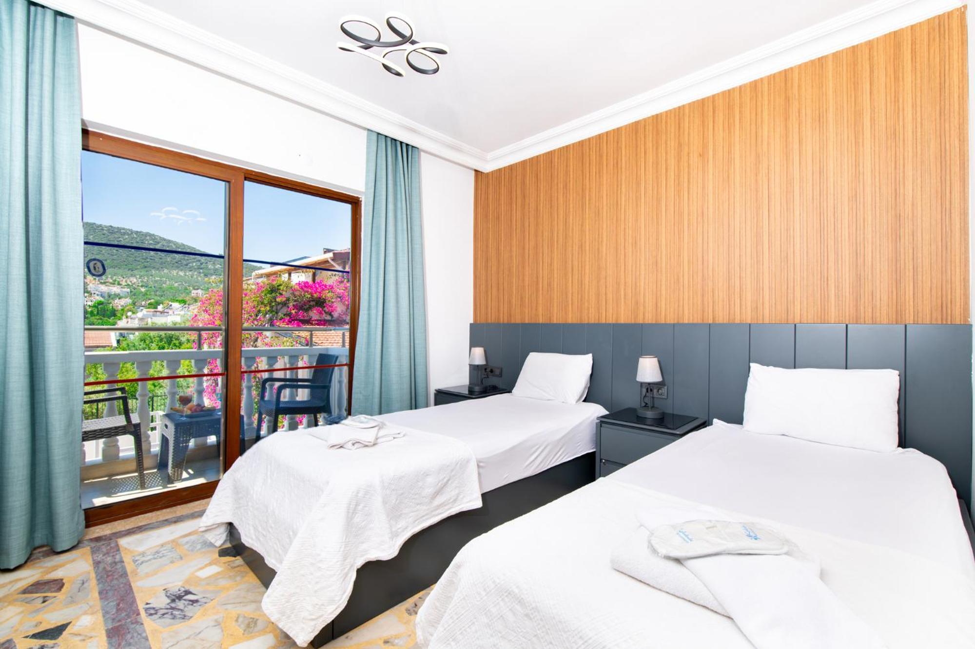 Kelebek Hotel Kalkan Esterno foto