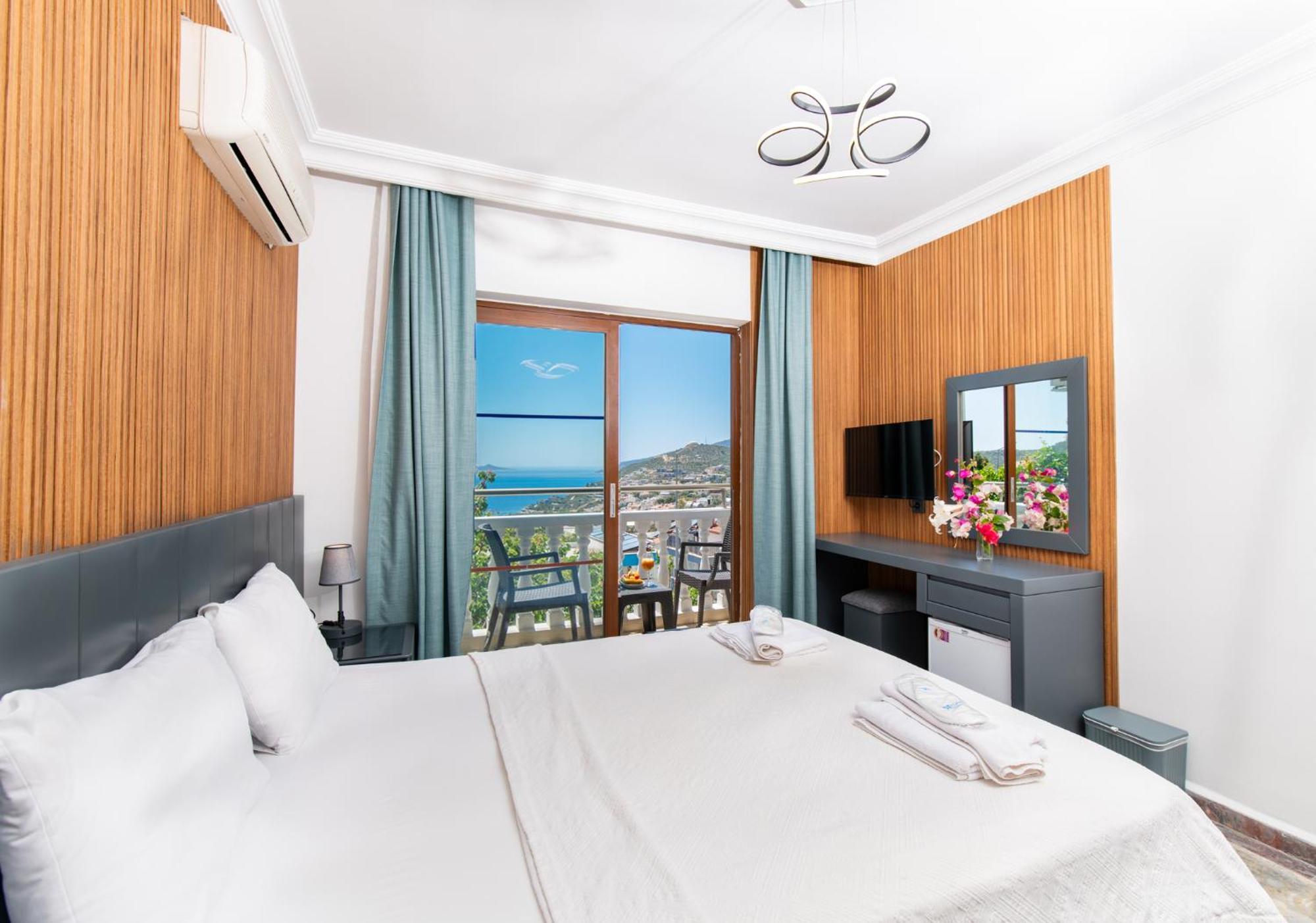 Kelebek Hotel Kalkan Esterno foto
